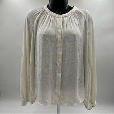 A new day cream soft button down flowy shirt size XS. can be dressed up or down