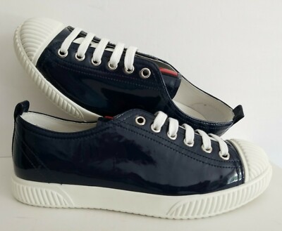 PRADA ICONIC NAVY PATENT LOGO WHITE CAP TOE