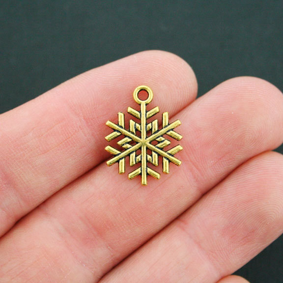 10 Snowflake Charms Antique Gold Tone Sided GC614