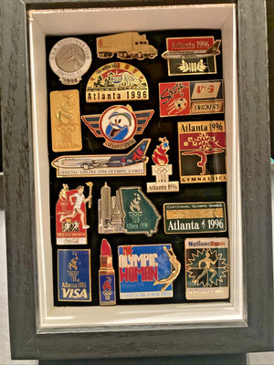 Official 1996 Centennial Celebration Olympic pins including Izzy, Coca-Cola, etc