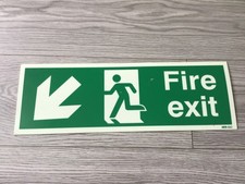 Image of Fire Exit Sign rigid plastic 450 x 150 Running Man Symbol with Directional Arrow