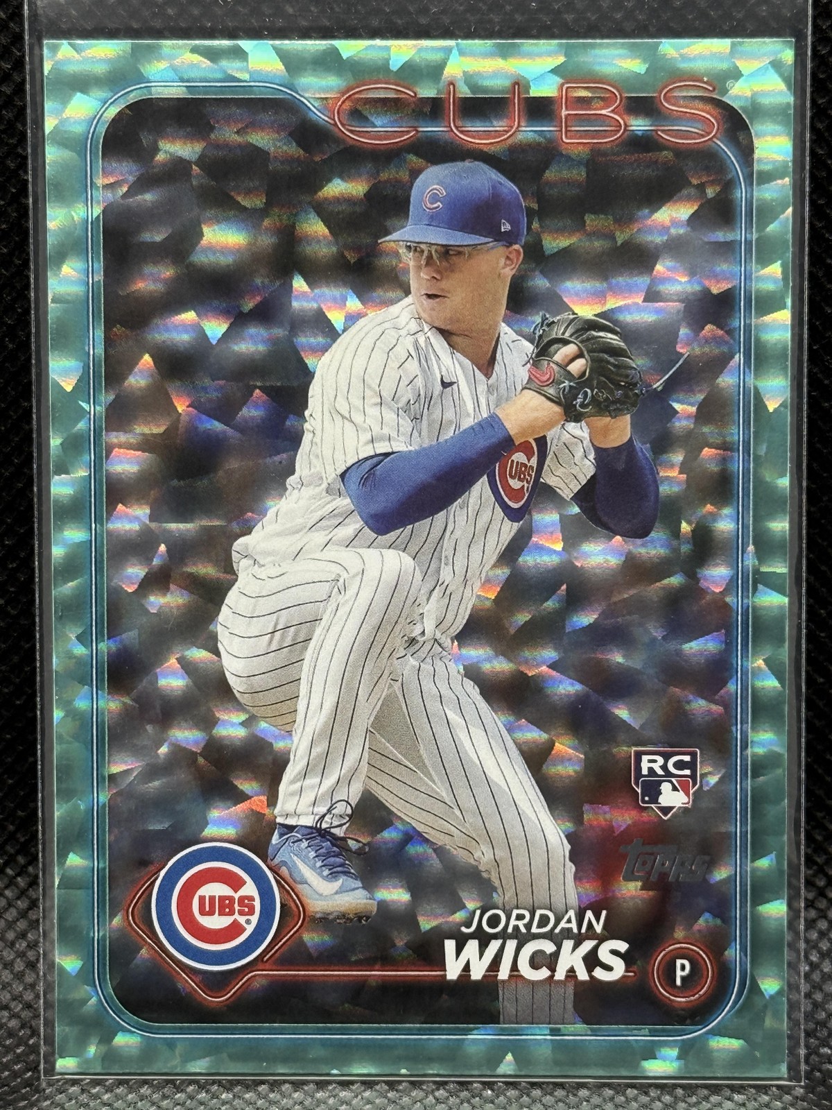 2024 Topps #613 Jordan Wicks Aqua Crackle Foil #/399