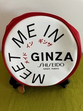 NEW SHISEIDO "MEET ME IN GINZA" RED, WHITE & BLACK CIRCULAR MAKE-UP BAG NEW 7"