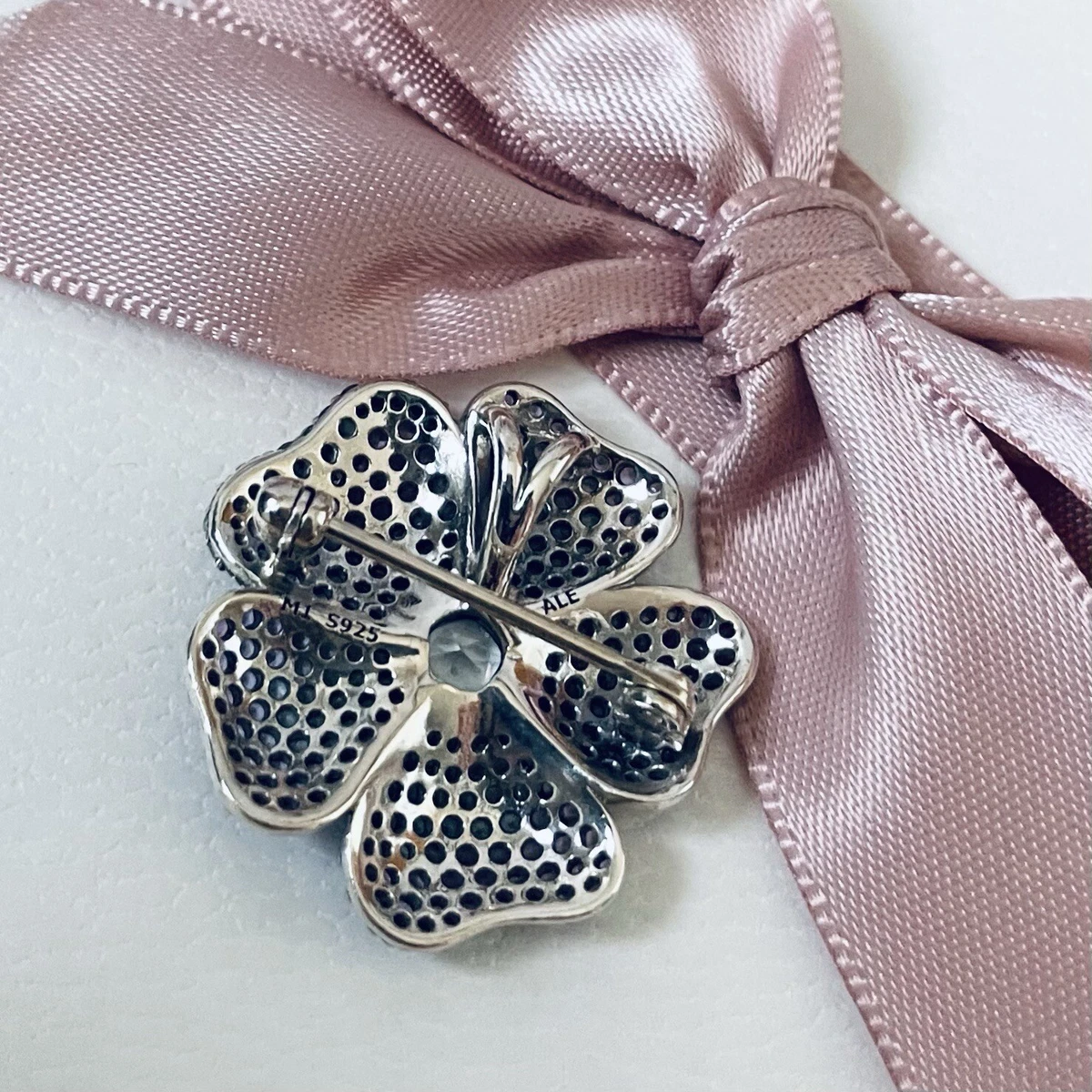 Pandora flower brooch deals