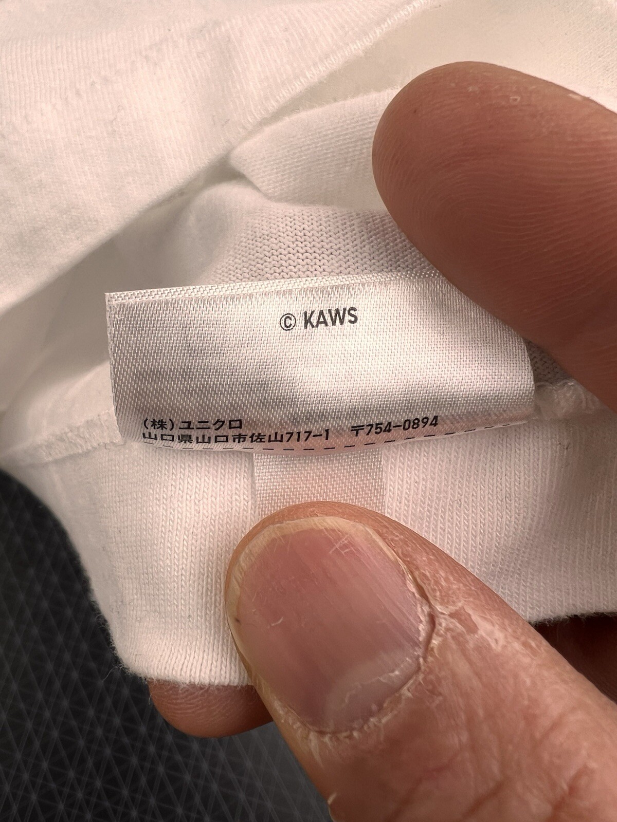 ALTRA T shirt bianca KAWS Flayed x Uniqlo UT Uomo taglia L e XL