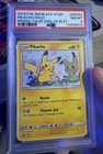 Pokémon Pikachu Holo Black Star Promo SM162 PSA 8 GALAXY SWIRL
