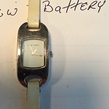 Nine West womens quartz analog dress rectangle silver-tone white dial leather