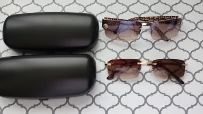 Set of TWO Women s Sunglasses and TWO Hard Cases with Button Closure Brown Lens