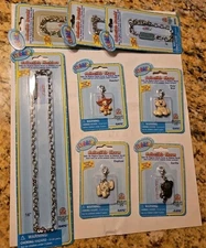 WEBKINZ SET OF 4 CHARMs + 3-BRACELETS+ 1-NECKLACE  - NEW W/ SEALED CODES