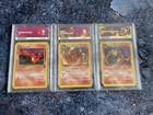 Ace Graded Team Rocket’s Charmander, Dark Charmeleon and Dark Charizard Pokemon