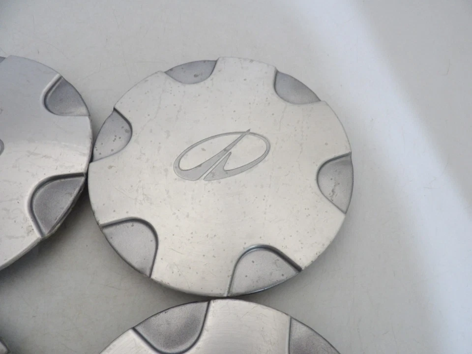 JUEGO DE 4 TAPAS CENTRALES DE LLANTAS DE ALEACIÓN OEM Oldsmobile Bravada 1998 1999 2000 - 2001 Foto 3 de 4