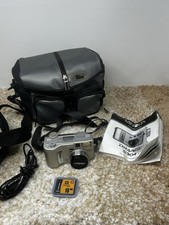 Minolta DIMAGE S304 3.3MP 4x Digital Camera - Silver W/ Card Case & Manual