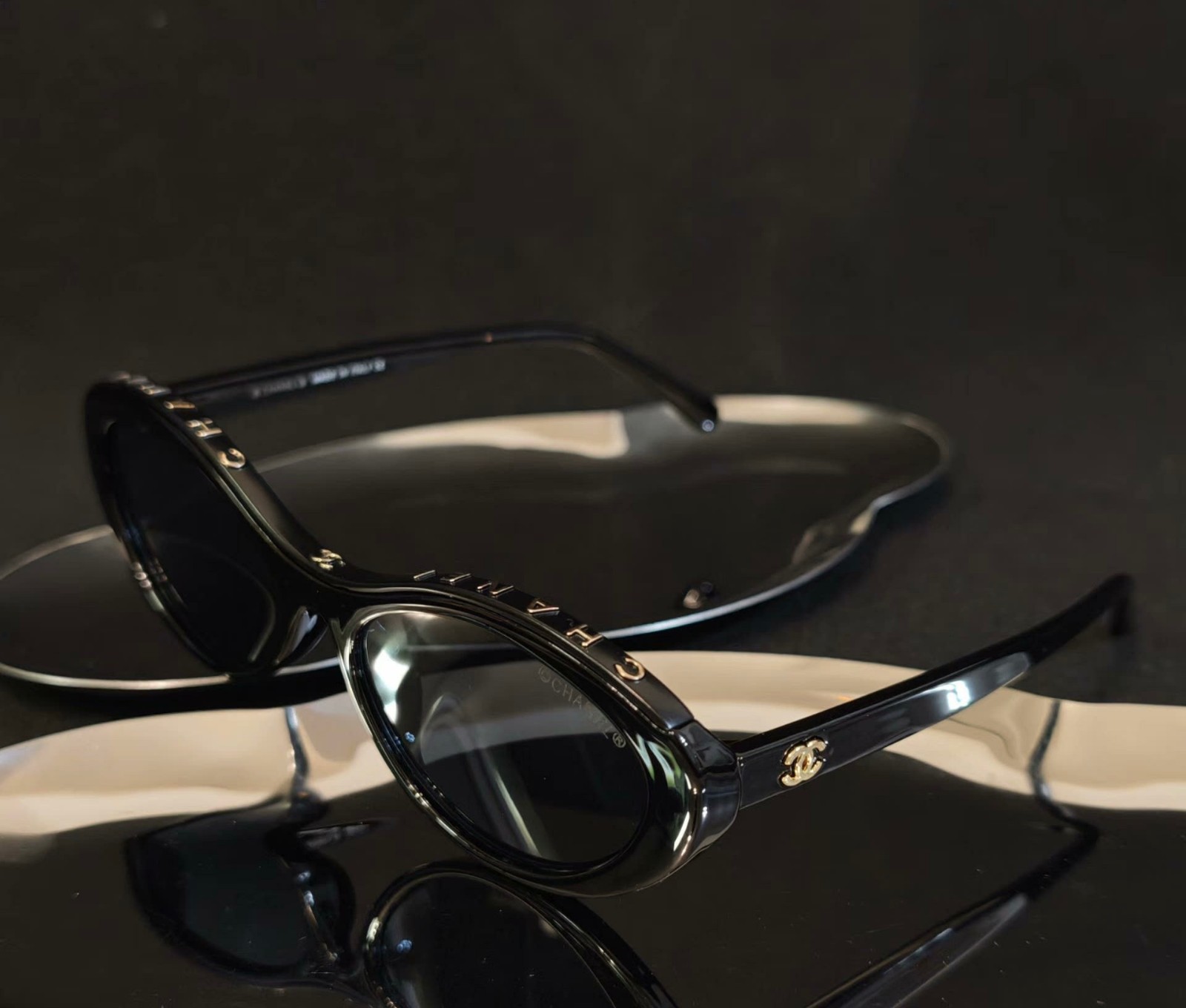 Chanel New Designer Sunglasses | Black Frame Gold Logo on Temple