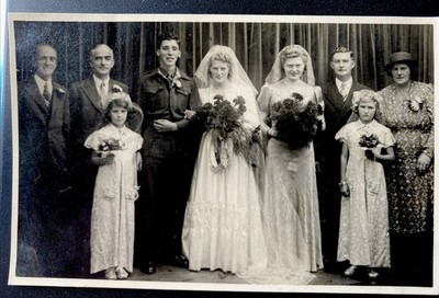 summer wedding photo 1940s silver white theme young bride uniformed groom