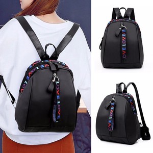 black nylon backpack purse