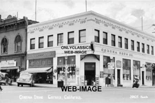 1953 CORONA CA REXALL DRUG BUILDING COCA-COLA SIGN MOTORCYCLE COP PHOTO MAIN ST