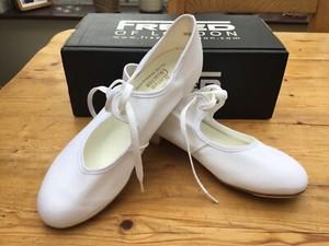 white canvas tap shoes