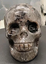 Yooperlite/Flame stone Skull Carving. SUPER UV REACTIVE