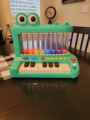 Battat BT1801 Croco Pop Piano Toy Keyboard with Songs Sounds Lights Green