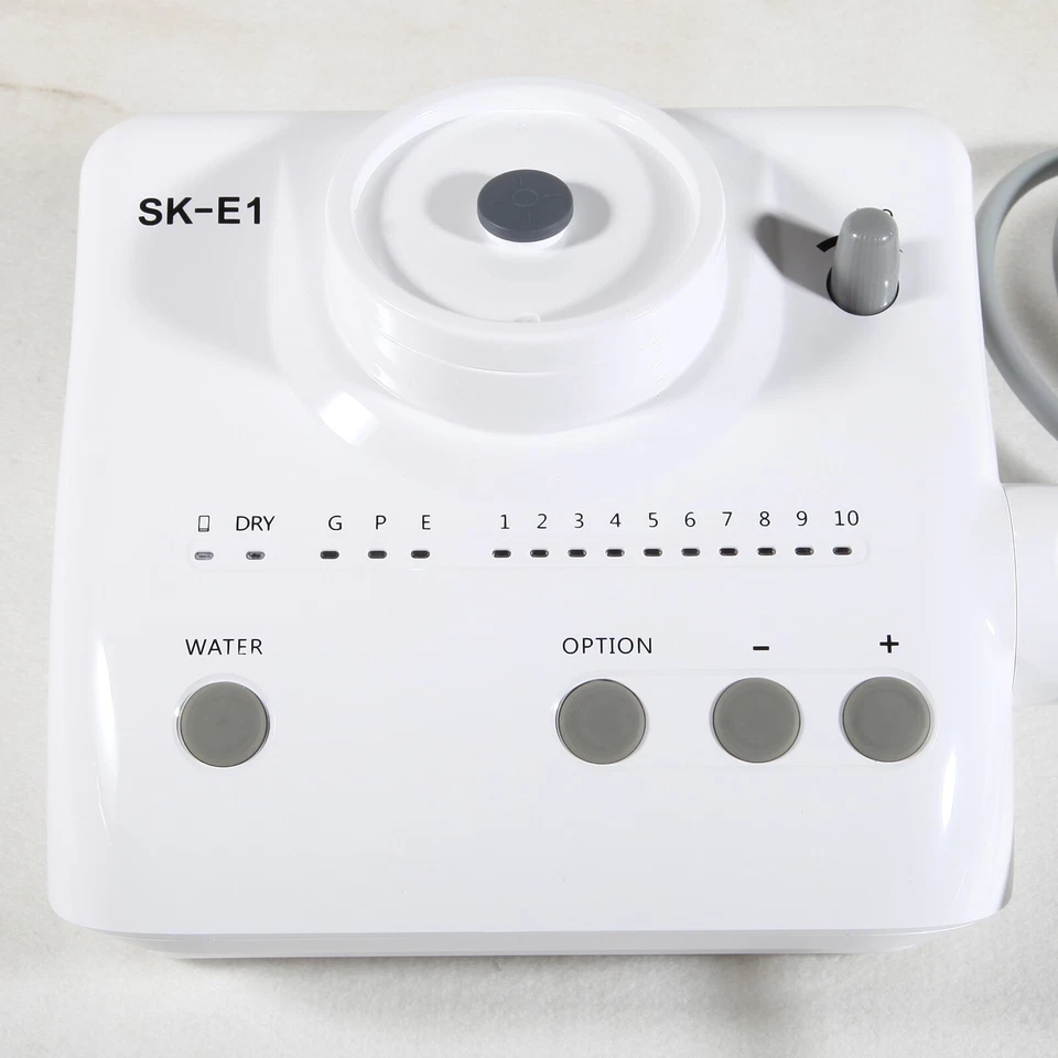 Escalador piezoeléctrico ultrasónico portátil dental 2* botellas aptas para pieza de mano EMS Foto 4 de 4