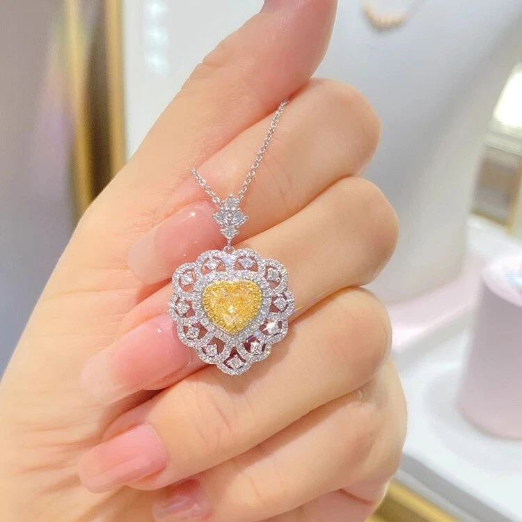 Nuevos collares plateados brillantes con gemas de citrino amarillo diseño corazón hueco para mujer niña Foto 3 de 4