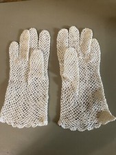 These delicate gloves are a lovely example of vintage crochet or lace dress glov