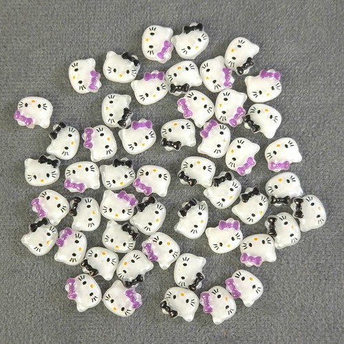 Sanrio Hello Kitty Small Flat Back Nail Charms Set of 50 in Purple and Black Bow - Picture 4 of 4
