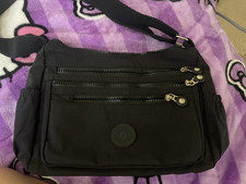 Black Unisex Medium Crossbody Sling Bag Adjustable Strap, Zipper, Multi Pockets