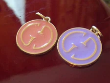 GUCCI 2 ZIP PULL  CHARM 23X20MM gold tone,  PINK.  PURPLE THIS IS FOR 2