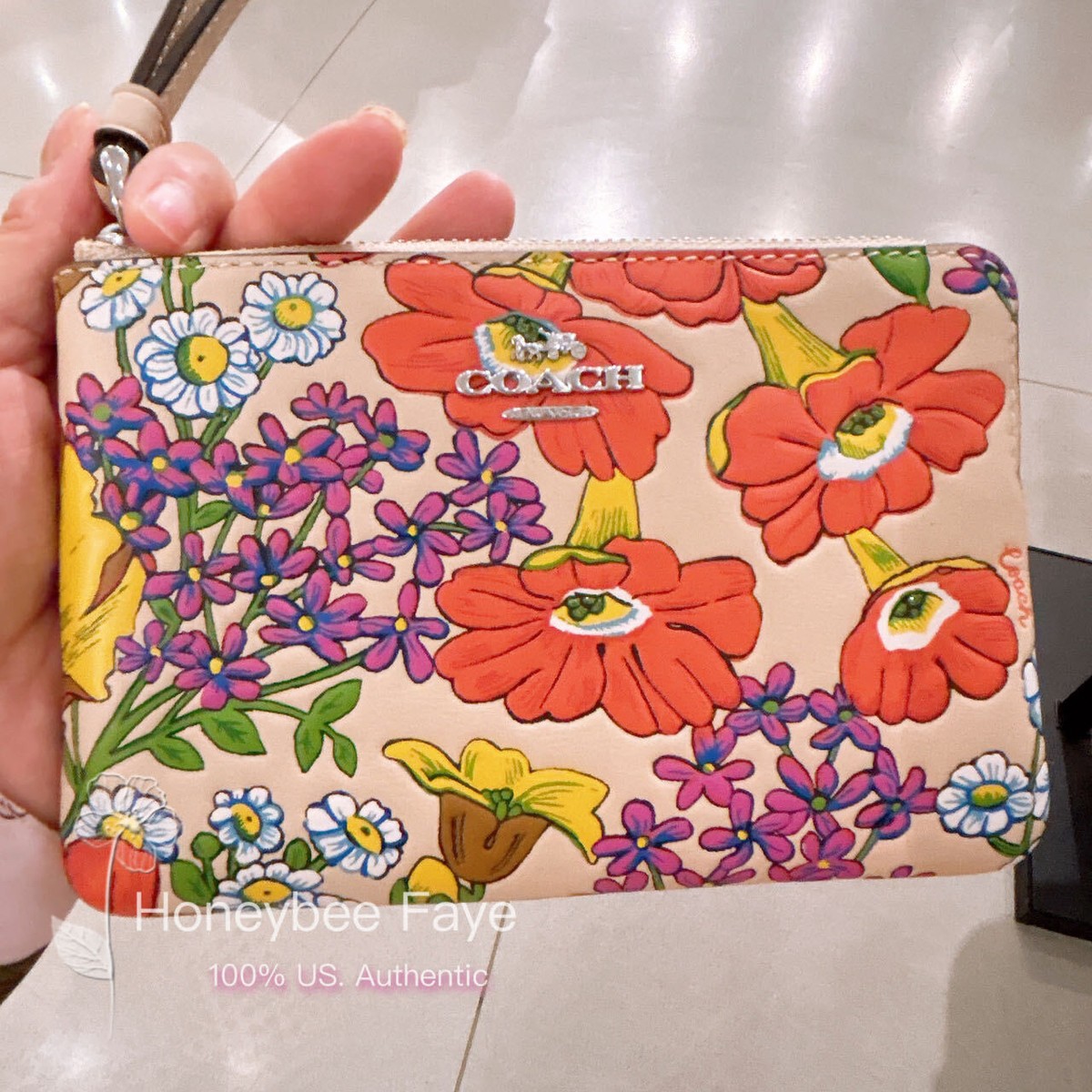 Coach corner zip wristlet floral Clearance