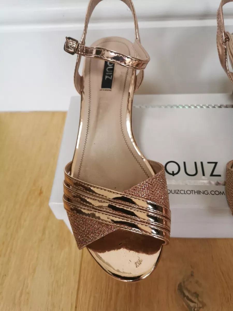 Quiz rose sales gold heels