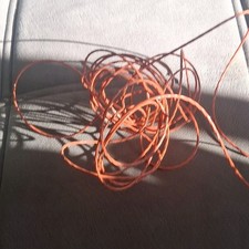 Orange cable wire used for grass trimmer