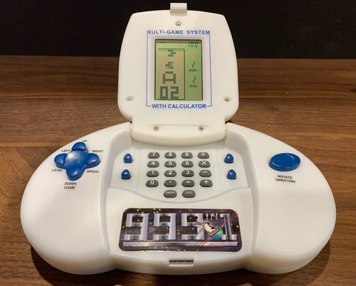 Vintage 999 In 1 Multi-Game System Calculator Hand Held Video Game DSM1406 LNC 