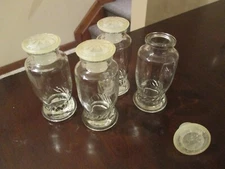 Vintage Upjohn Embossed Clear Glass Bottles Set of 4 w/lids One Cracked Lid