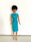 Vintage Black Raven Bubble-Cut Barbie Doll wearing Turquoise Silk Sheath Dress