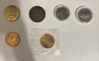 4 trade/souvenir dollars  4 US and 2 from Canada.  Seattle Worlds Fair/EXPO 74
