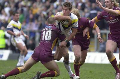 Brent Grose of the Warrington Wolves tries to evade a tackle duri - Old Photo