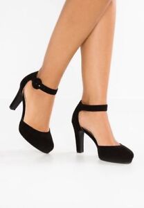 zapatos altos de mujer color negro