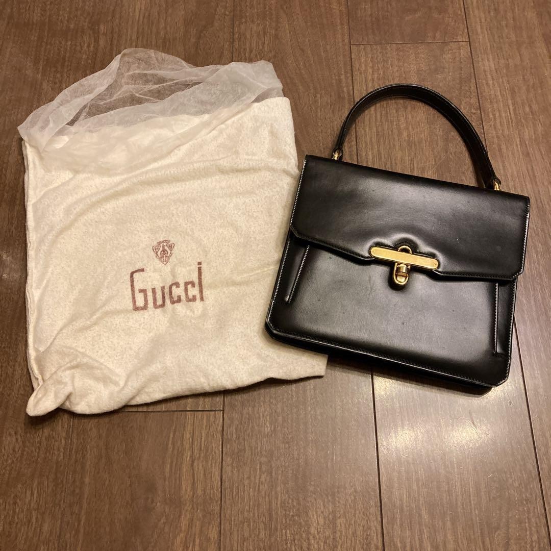 Gucci black leather handbag with gold hardware style PG0O4G