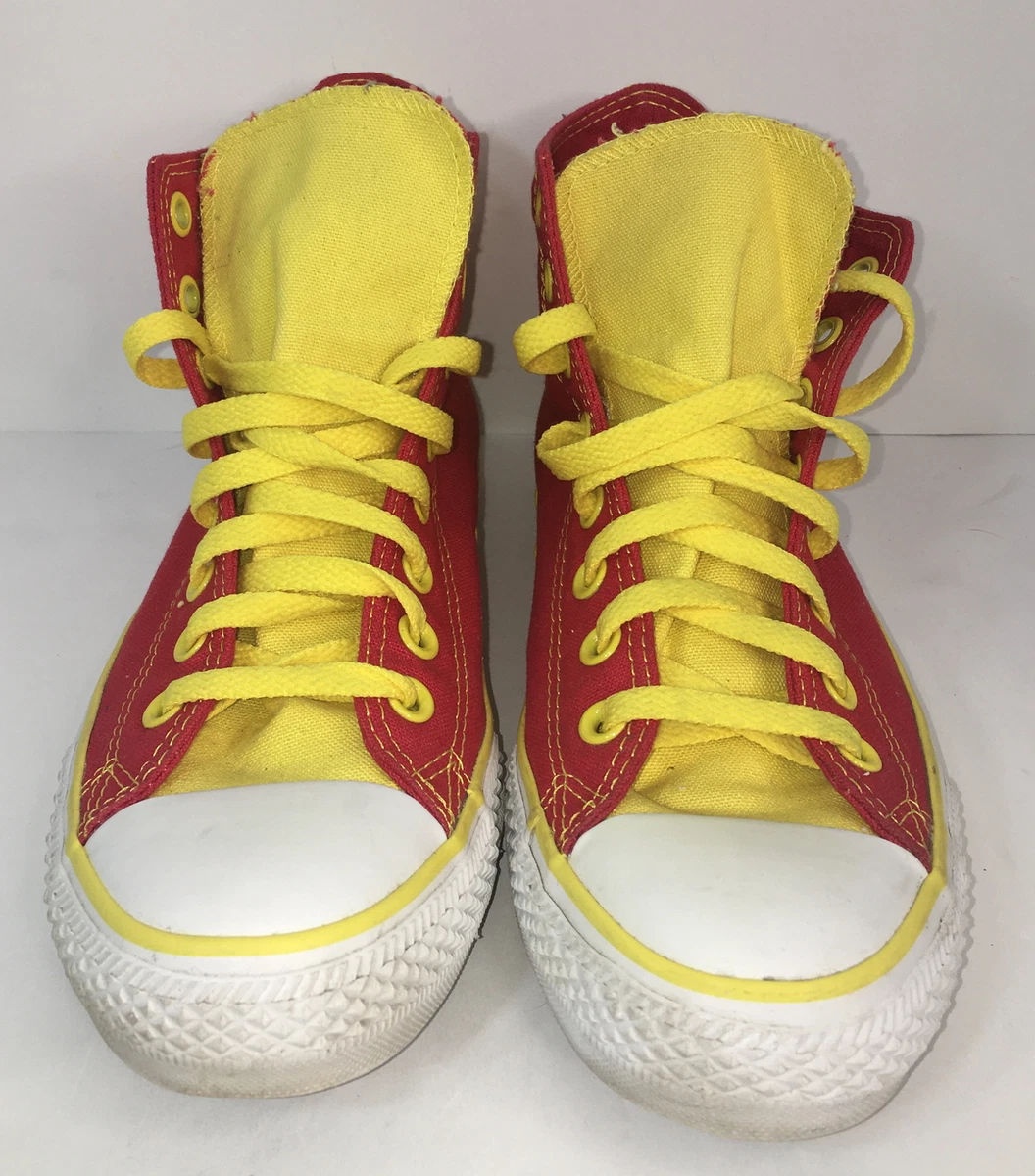 Yellow and store red converse