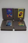 Lot of 4 Nintendo NES games As Is Super Mario 3, Tetris, Top Gun & Arch Rivals