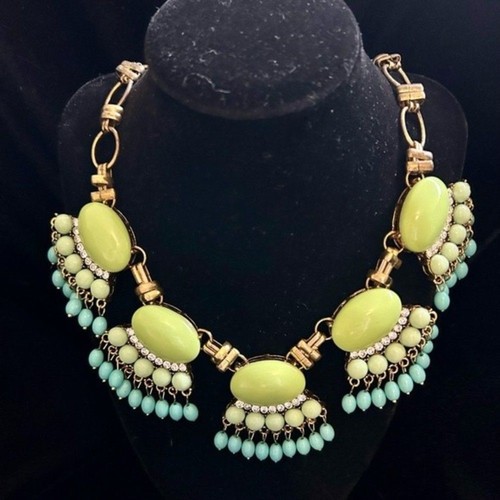 Green and turquoise fan fringe statement necklace on gold color chain
