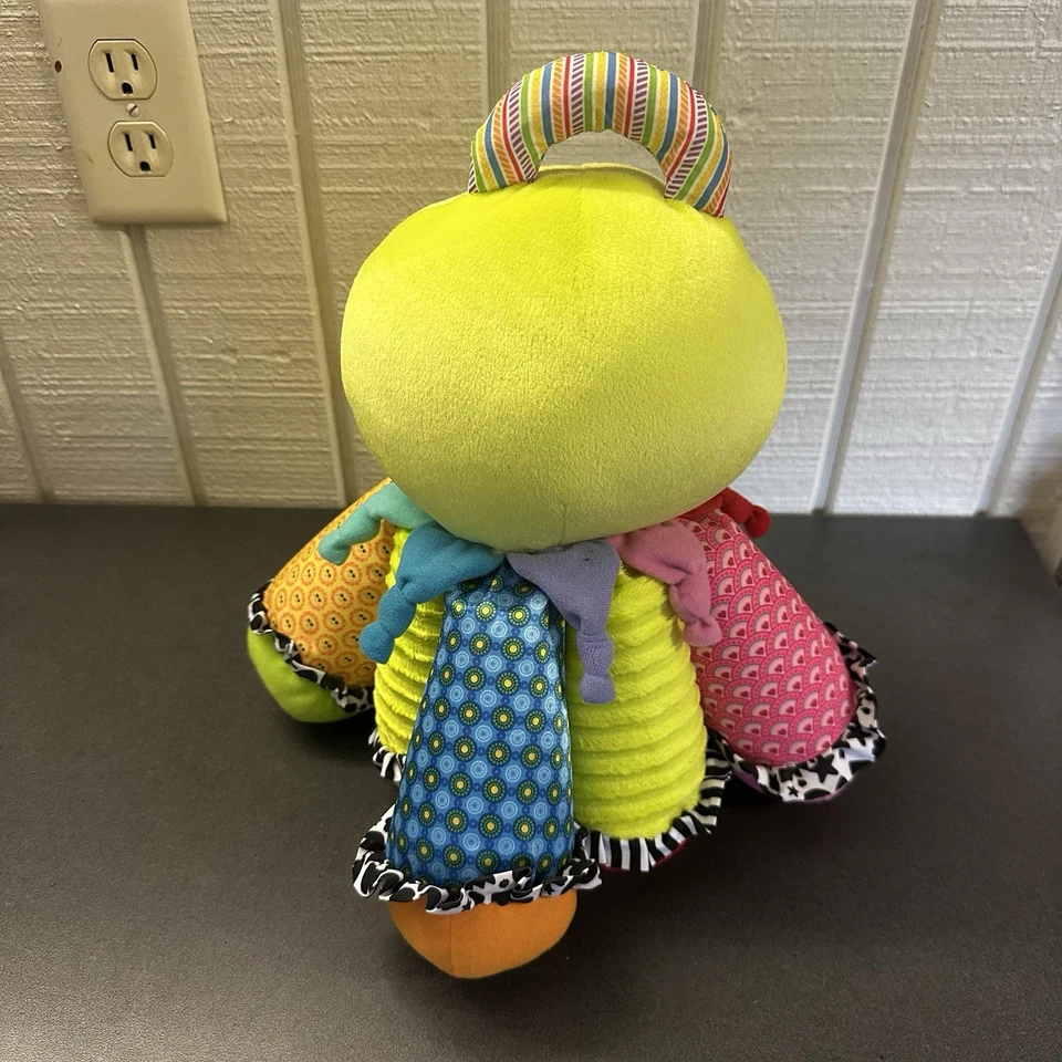 Детская игрушка Lamaze Octotunes 2 сенсорное развитие музыкальный писк зеленый осьминог б/у в отличном состоянии - Изображение 4 из 4