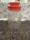 Vintage TANG Anchor Hocking Glass Jar LILIES Of The VALLEY Orange Plastic Lid