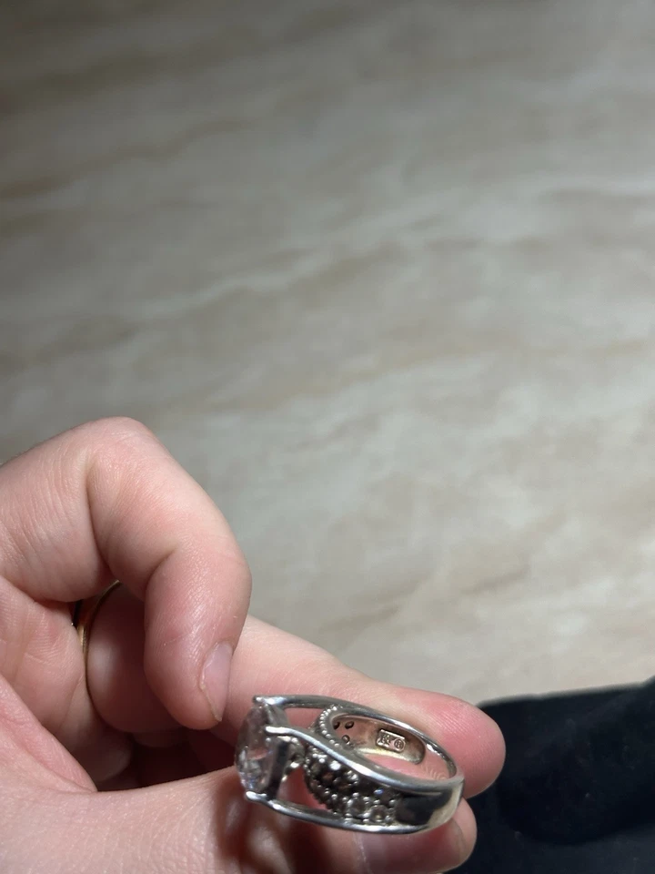 sterling silver ring with a large central cubic zirconia stone and small stone 5 - Image 3 of 4