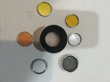 Lot of 7 Camera Filters, Lens Hoods, Lenses , Different Sizes/Brands , Case.