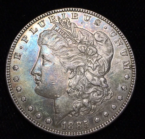 1885-P MORGAN SILVER DOLLAR. AU TYPE BEAUTIFULLY DUAL-SIDED TONED. NICE COIN!