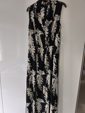 Women's Sleeveless Maxi Dress (floor-length or ankle-grazing) in a black base 10