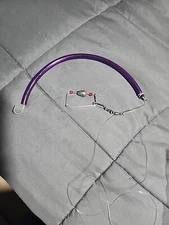 12" Striper Bass Lure Tube, with Rudder and Leader. Tube Color: Dark Purple.