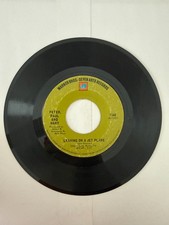 Peter, Paul, and Mary 45 RPM Record - Leaving On A Jet Plane /  The House Song